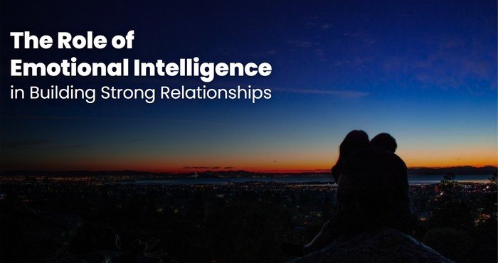 Couple sitting close above city lights at dusk, a strong relationship built on emotional intelligence